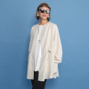 ヨーコモリモト 端境期は簡単アレンジで モードを軽やかに羽織れる デザインチュニック
