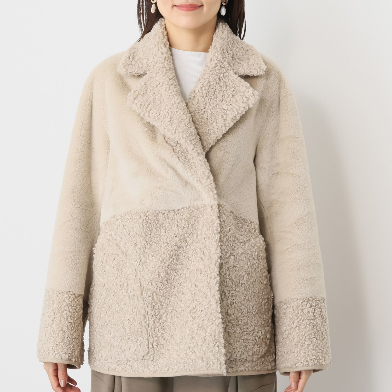 ゼラールスポーツ フェイクムートン リバーシブルで楽しめる ファー切替デザイン ピーコート