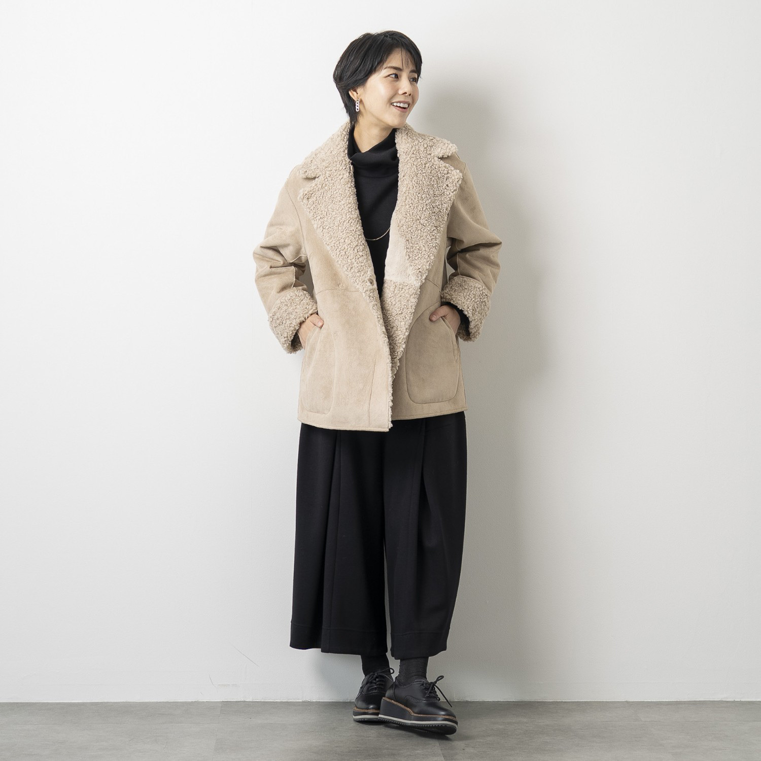 ゼラールスポーツ フェイクムートン リバーシブルで楽しめる ファー切替デザイン ピーコート