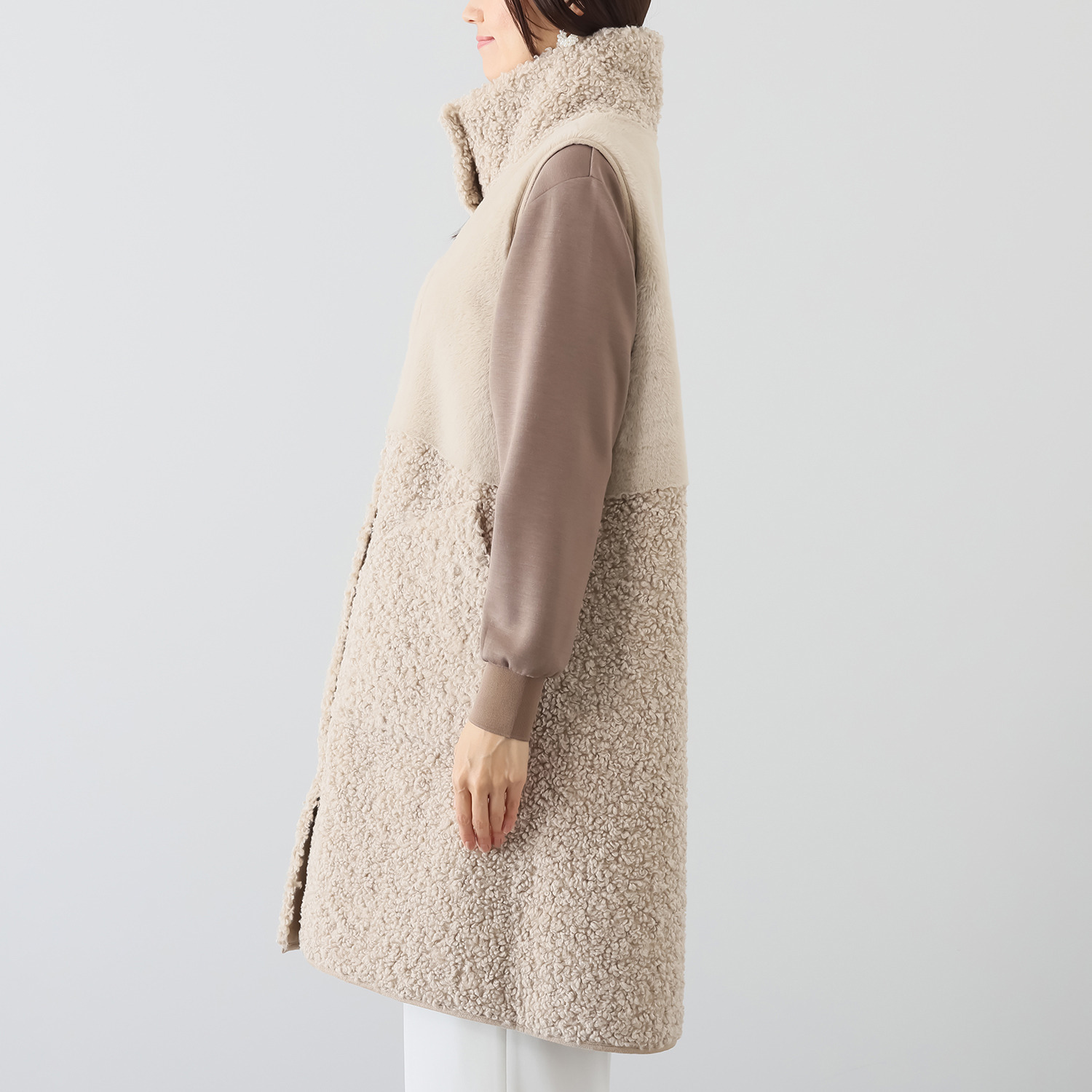 ゼラールスポーツ フェイクムートン リバーシブルで楽しめる ファー切替デザイン スタンドネックロングジレ