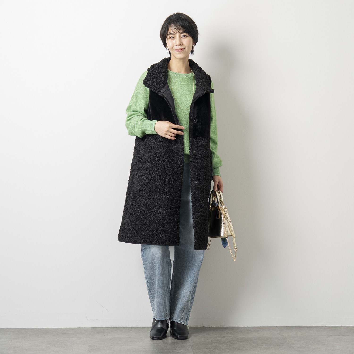 ゼラールスポーツ フェイクムートン リバーシブルで楽しめる ファー切替デザイン スタンドネックロングジレ