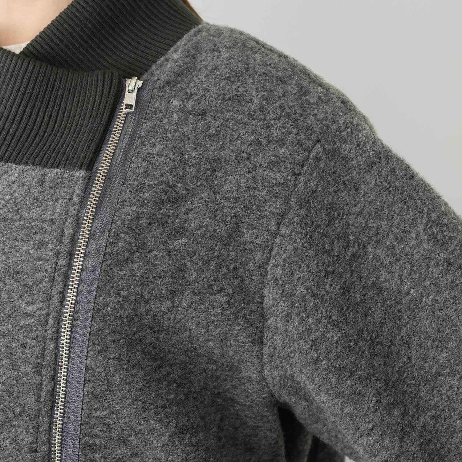 コモエリークローゼット 異素材＆ アシメジップが光るコート