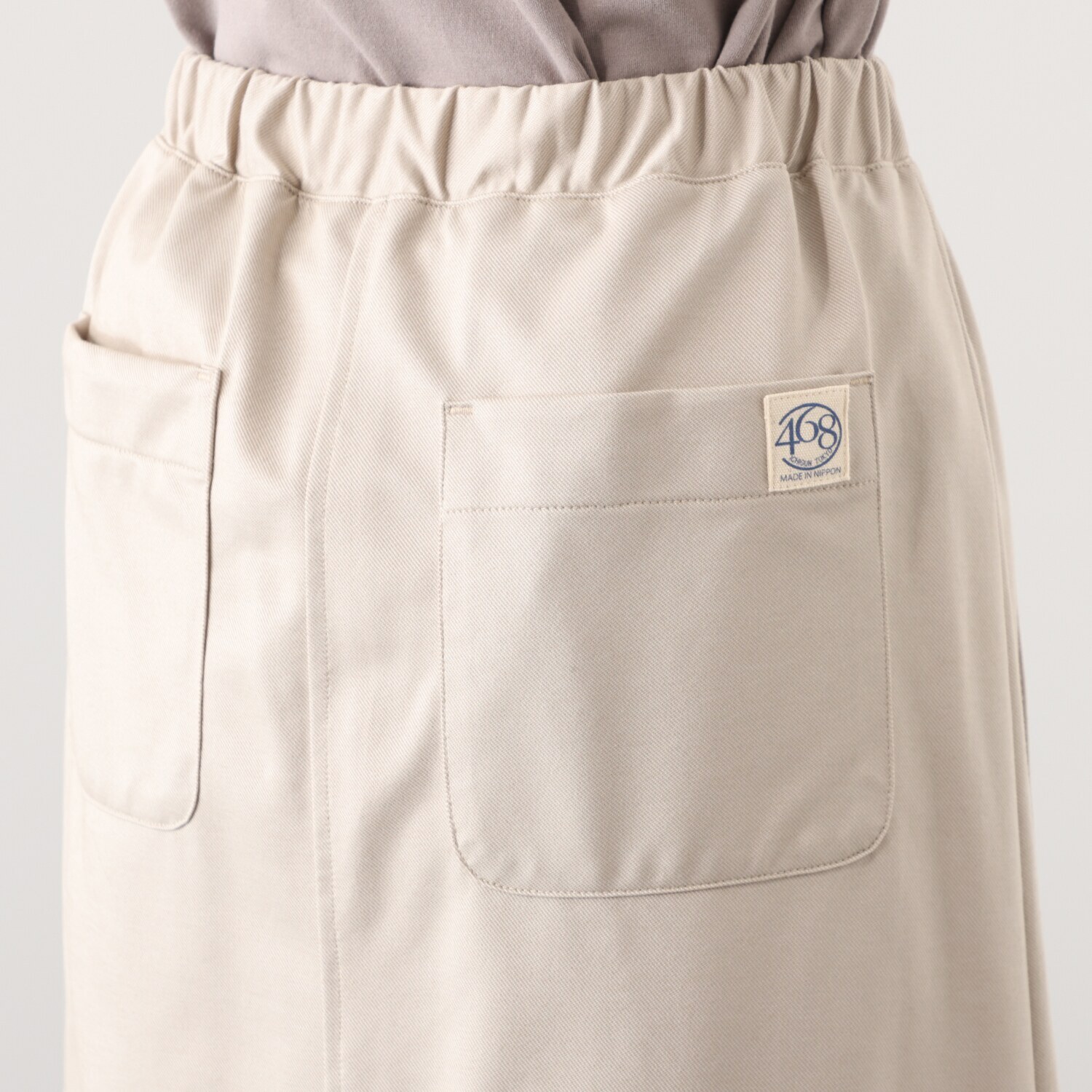 シロヤイチガントウキョウ ベルガモ ツイル ラップ風スカート