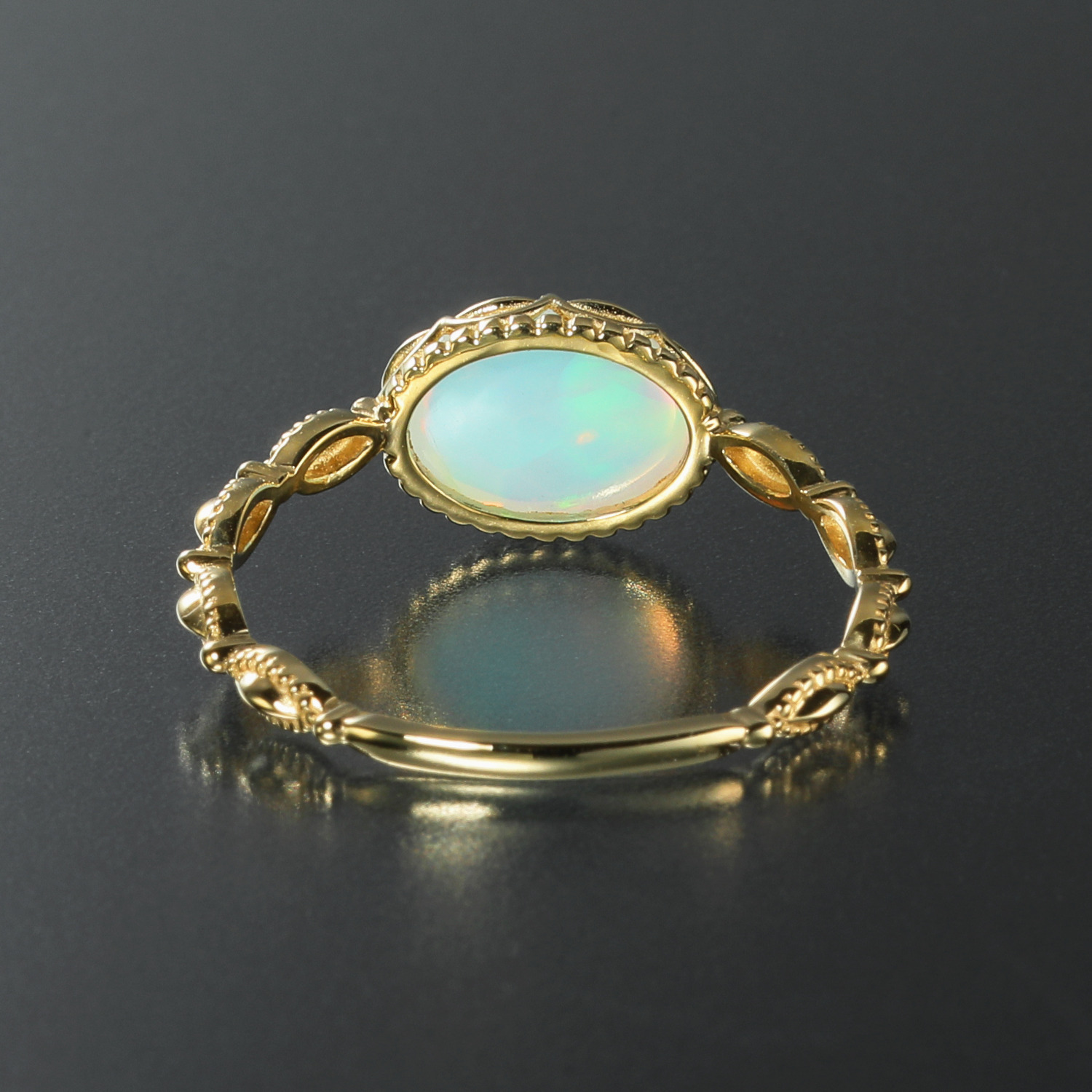 カレイドスコピオ 宝石界の万華鏡 １８Ｋ オパールリング